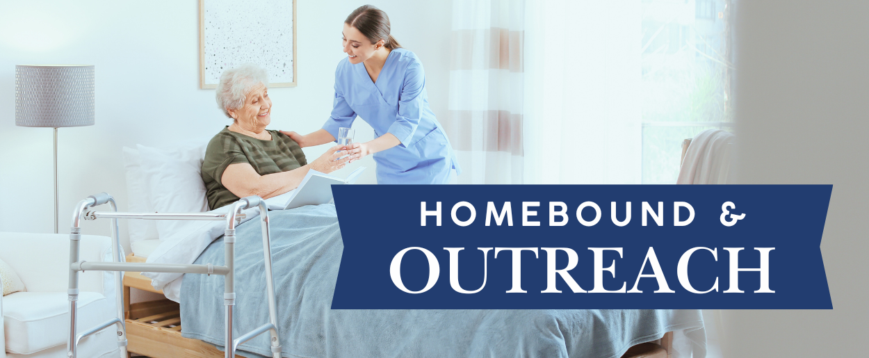 outreach home bound services. elderly woman in bed with book and caregiver. 